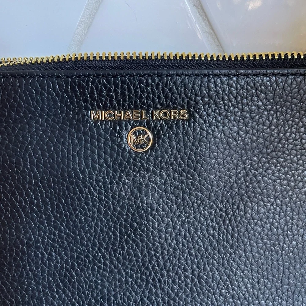 Michael Kors Jet Set Clutch Wristlet Excellent condition!